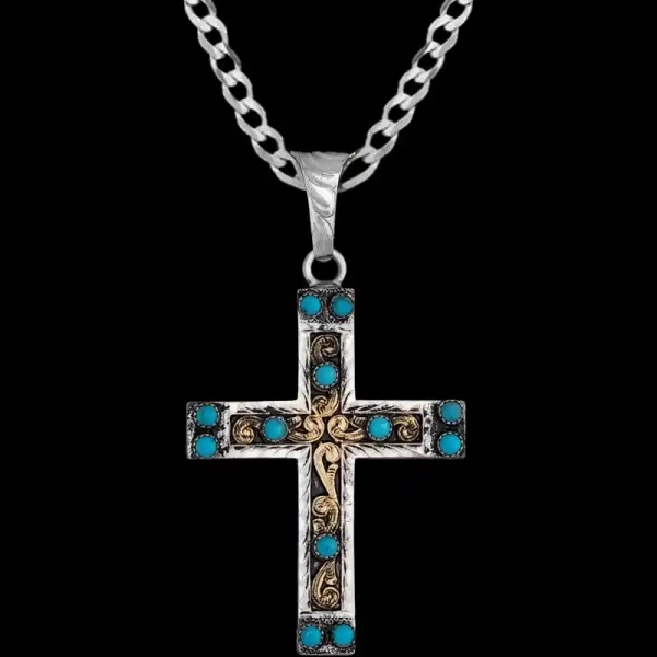 Meet the Isaiah Cross Pendant Necklace, a stunning German Silver Cross featuring intricate scrollwork and 12 turquoise stones. Customize it and add an special discount sterling silver chain today!